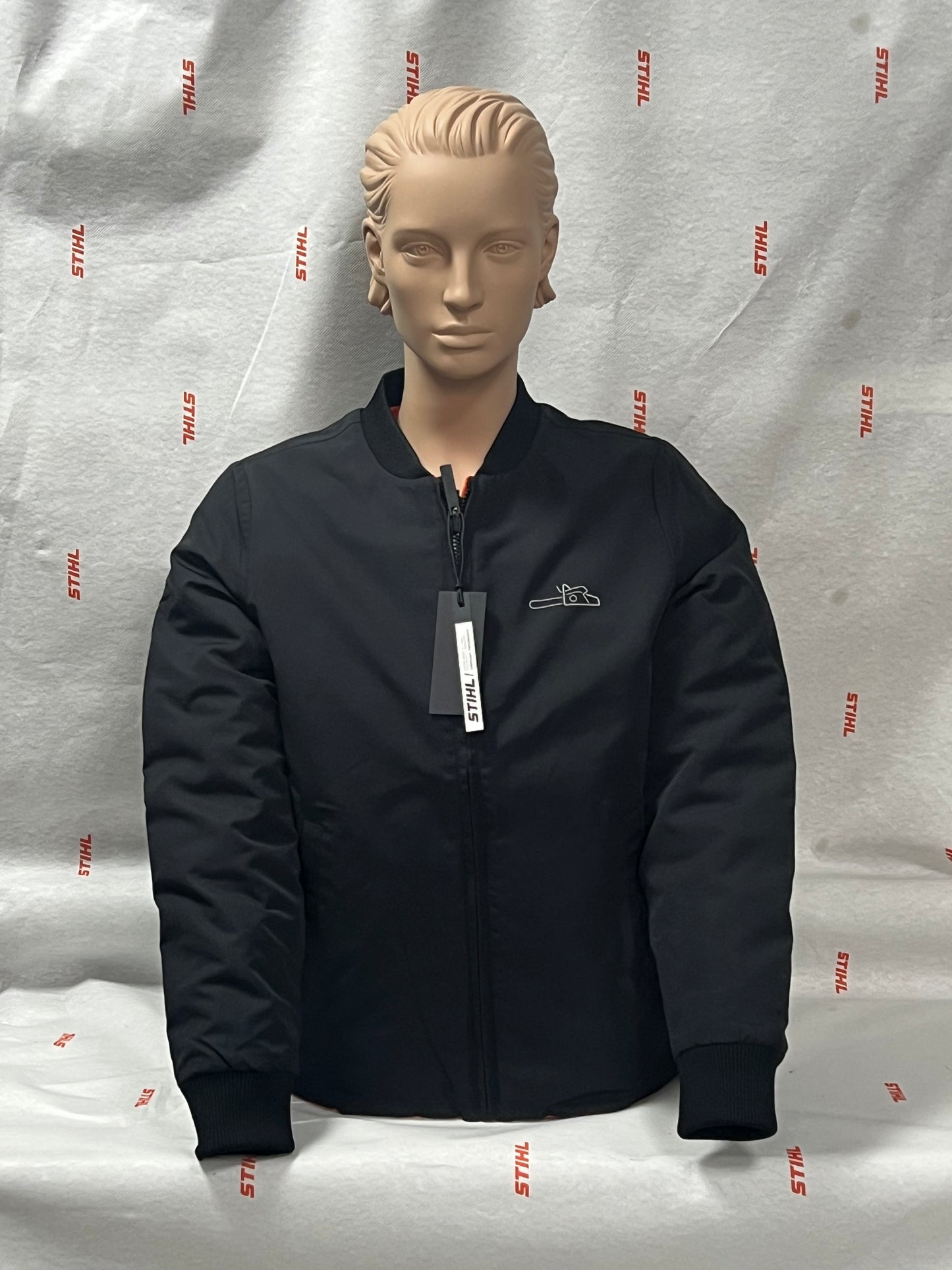 Giacca donna reversibile Stihl nera con stampa riflettente motosega, taglia M
