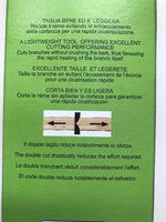 Immagine di una confezione verde con testo in quattro lingue (italiano, inglese, francese, spagnolo) che descrive un attrezzo da taglio leggero e performante, che evita lo schiacciamento della corteccia per una rapida cicatrizzazione e riduce lo sforzo.