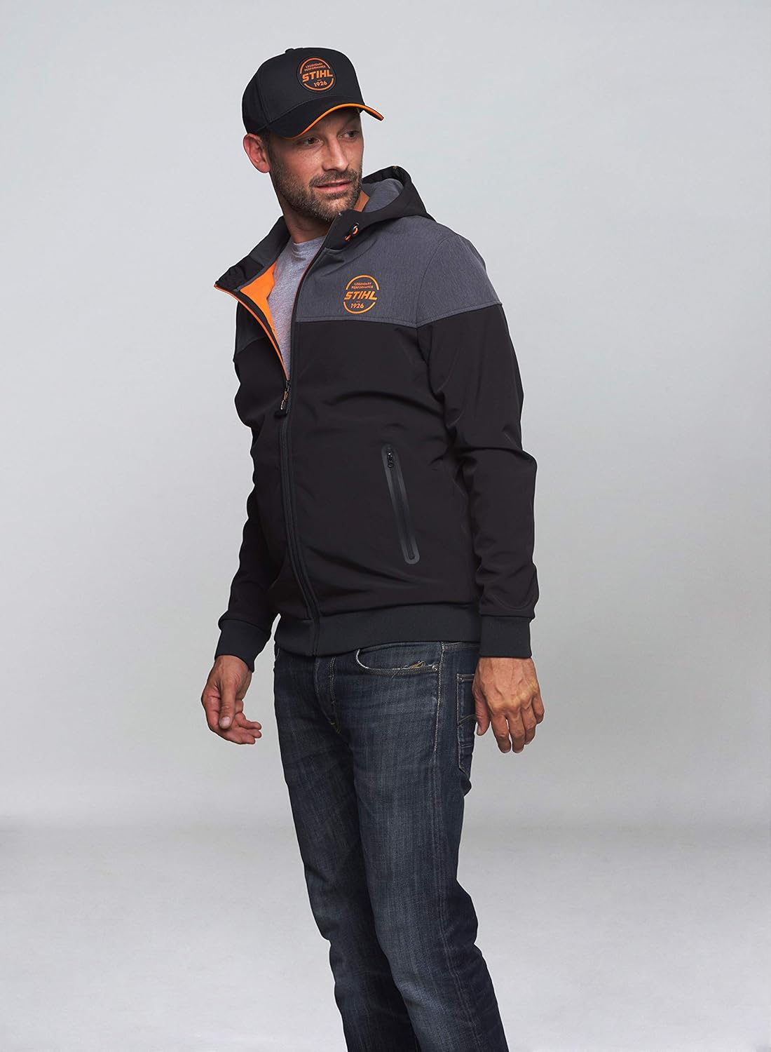 Berretto da baseball Stihl Logo Circle indossato, nero con patch arancione frontale