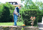 Utilizzo del rifinitore elettrico STIHL FSE 71 per rifinitura del prato vicino a siepi e bordi