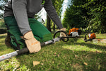 STIHL KM 94 RC-E motore Kombi a scoppio in utilizzo su prato con asta divisibile