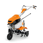 Motozappa STIHL MH 600 vista laterale con stegola di guida e ruote di trasporto